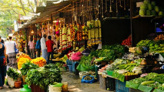 Colorful street market in Malleshwaram with local produce and flower stalls