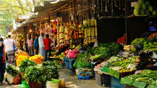 Colorful street market in Malleshwaram with local produce and flower stalls