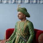 A detailed portrait of a man in regal South Indian attire, resembling a historical ruler like Tipu Sultan.