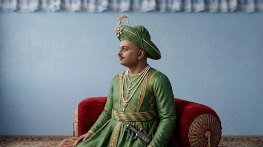 A detailed portrait of a man in regal South Indian attire, resembling a historical ruler like Tipu Sultan.