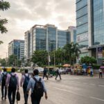 High rise corporate campuses and glass facades along the main ITPL road in East Bangalore.